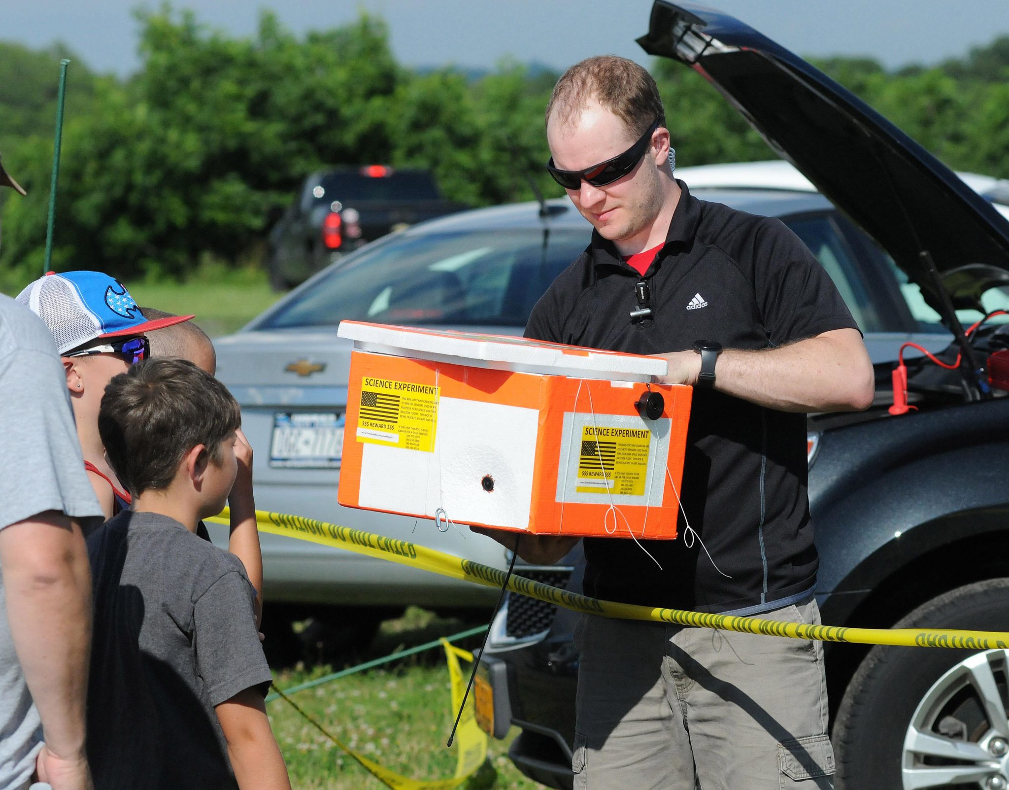 Kids learning about our weather balloon launch operations!