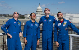 astronauts-protect-their-eyes-with-eclipse-glasses