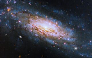 hubble-views-a-galaxy-with-a-voracious-black-hole