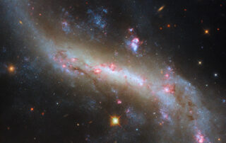 hubble-views-the-lights-of-a-galactic-bar