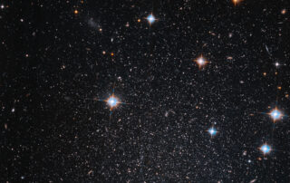 hubble-pinpoints-a-dim,-starry-mini-galaxy