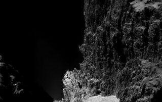 A Kilometer High Cliff on Comet Churyumov – Gerasimenko