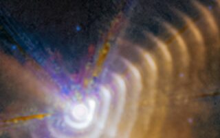 webb-watches-carbon-rich-dust-shells-form,-expand-in-star-system