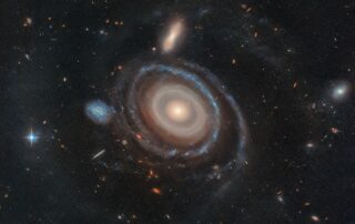 straight-shot:-hubble-investigates-galaxy-with-nine-rings