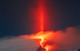 Light Pillar over Erupting Etna