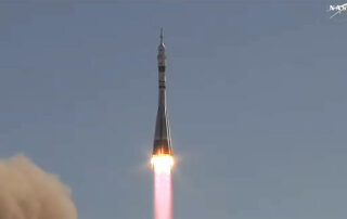 new-crew-lifts-off-aboard-soyuz-rocket-toward-station