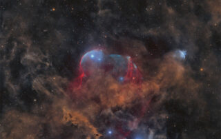 Between Scylla and Charybdis: A Double Cosmic Discovery