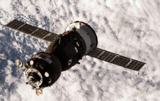 three-crewmates-aboard-soyuz-approaching-station-for-docking