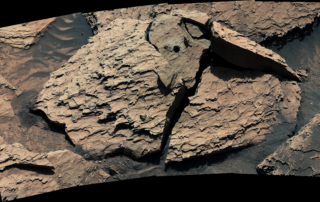 curiosity-shakes-loose-a-pesky-rock