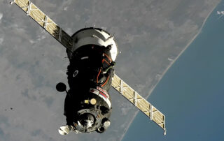 soyuz-docks-to-station,-hatches-open-soon-for-crew-greeting