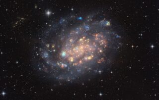 NGC 300: A Cosmic Gemstone with Stars and Gas Clouds